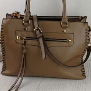 A Cool Crossbody Satchel With Saavy Lines & Cool Features!